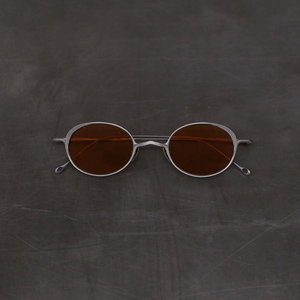 Rigards RG1076TI Series Oval Frame Sunglasses RG-RG1076TI-GDTGY Antique Titanium Frame | Salmon Lenses
